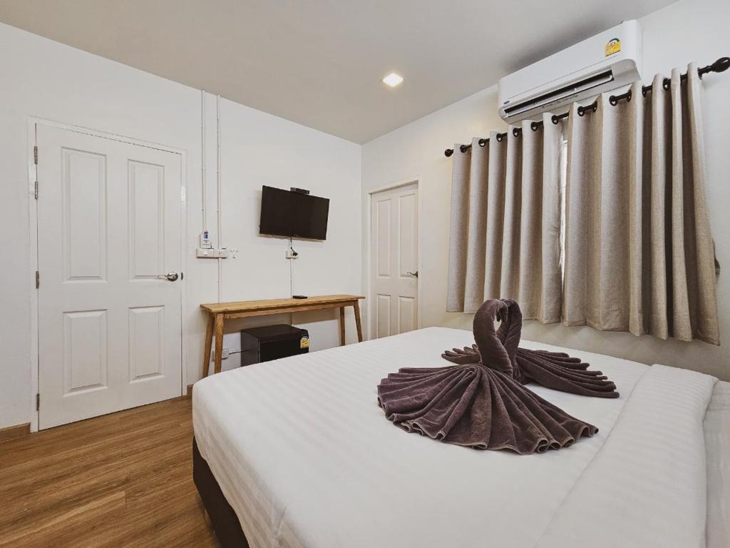 Postel nebo postele na pokoji v ubytování Casa Maya House