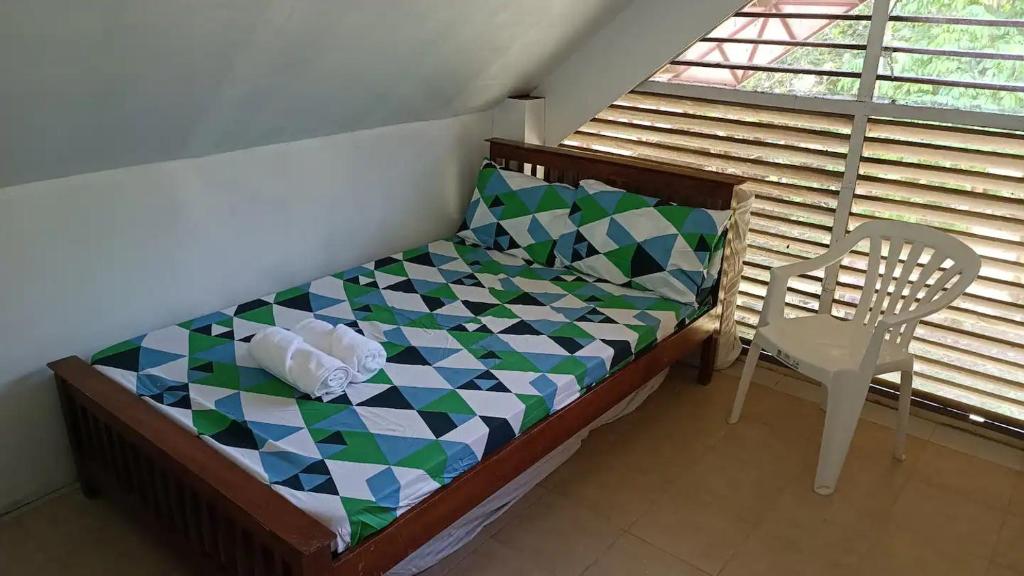 Postel nebo postele na pokoji v ubytování CamiStays Homestay in Camiguin, Best for Groups or Family