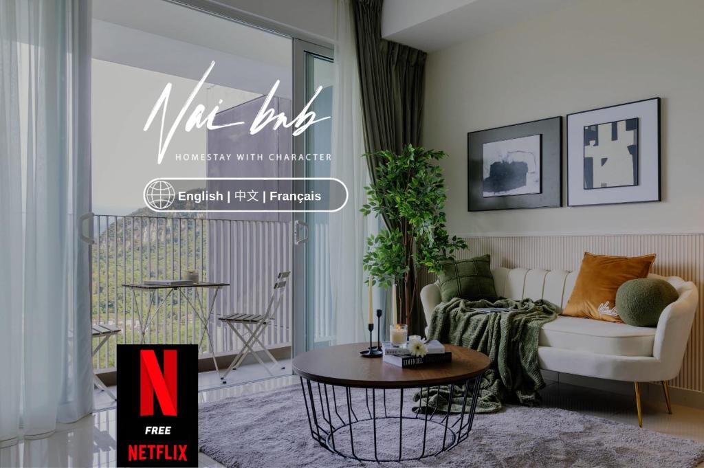 a living room with a couch and a table at NaiBnB in Nadayu 63 in Kuala Lumpur