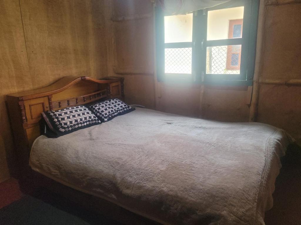 Postel nebo postele na pokoji v ubytování Sisters homestay