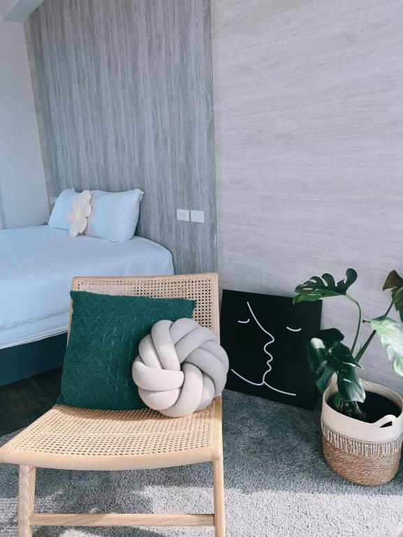 Postel nebo postele na pokoji v ubytování Wei Wei Chu B&B