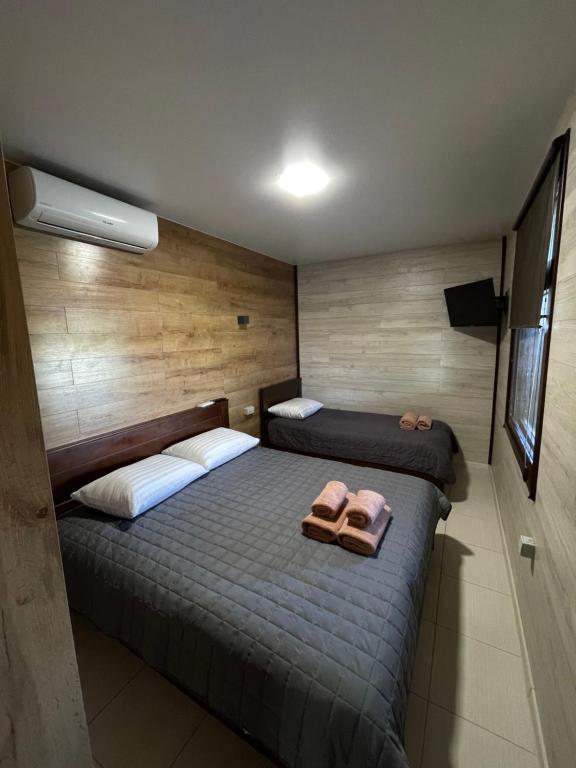 Postel nebo postele na pokoji v ubytování Hotel Voyage Вояж