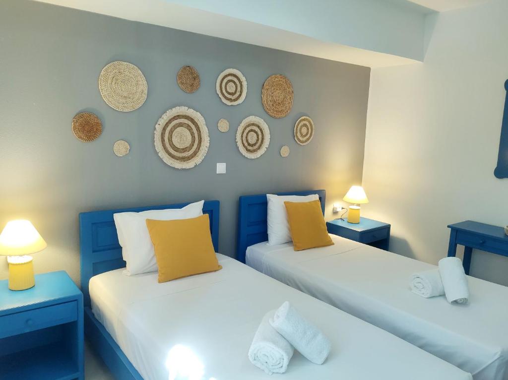 Łóżko lub łóżka w pokoju w obiekcie Summer Dream Cottage, 2BR, Beautiful sea view