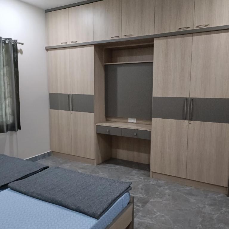 Postel nebo postele na pokoji v ubytování Sukrithi Premium Serviced Apartment - F2