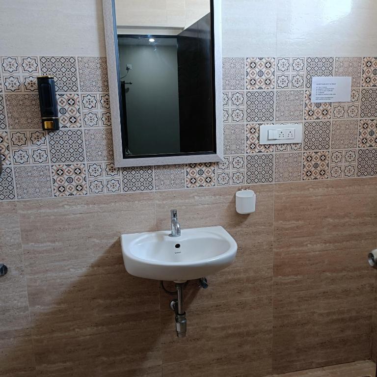 Koupelna v ubytování Sukrithi Premium Serviced Apartment - F2