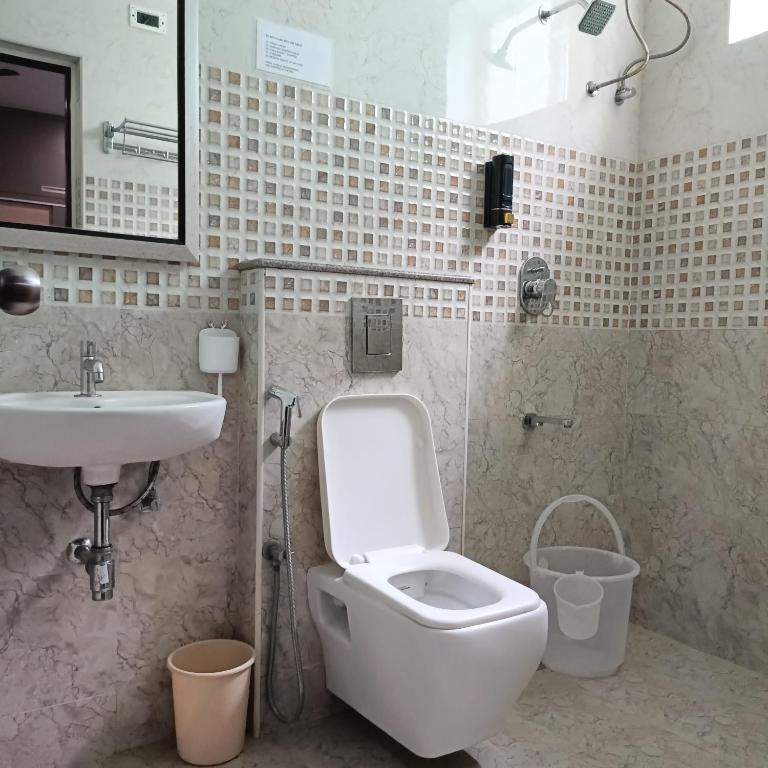 Koupelna v ubytování Sukrithi Premium Serviced Apartment - F2