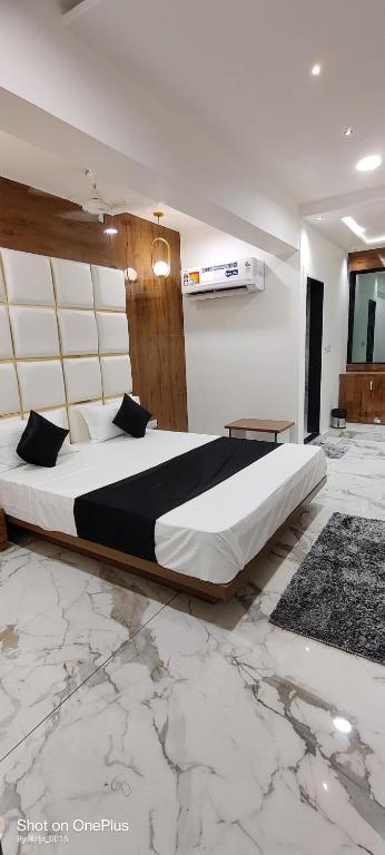 Postel nebo postele na pokoji v ubytování Hotel New German