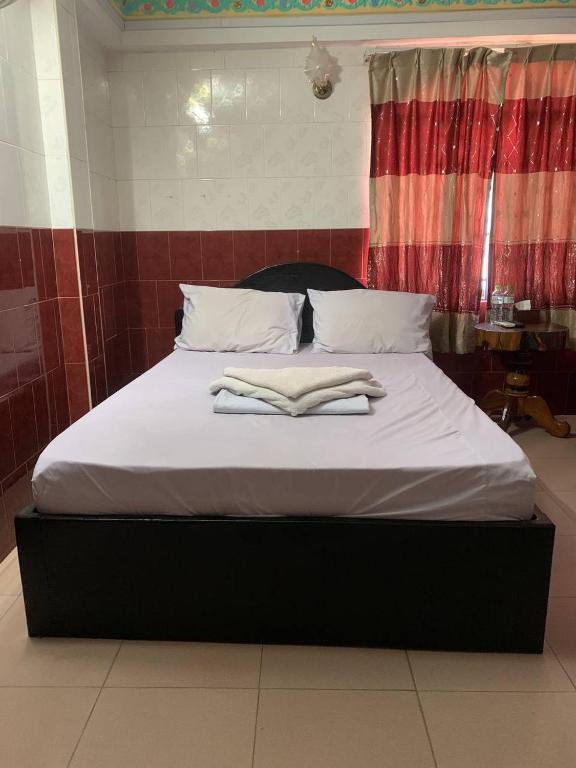 Postel nebo postele na pokoji v ubytování Ditar Guest House D