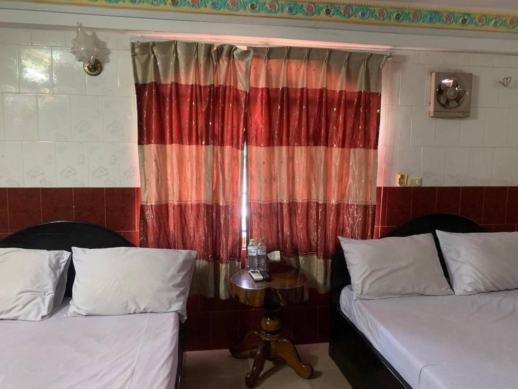Postel nebo postele na pokoji v ubytování Ditar Guest House D