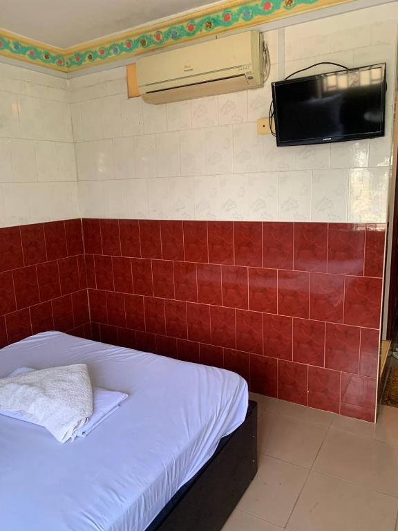 Postel nebo postele na pokoji v ubytování Ditar Guest House D