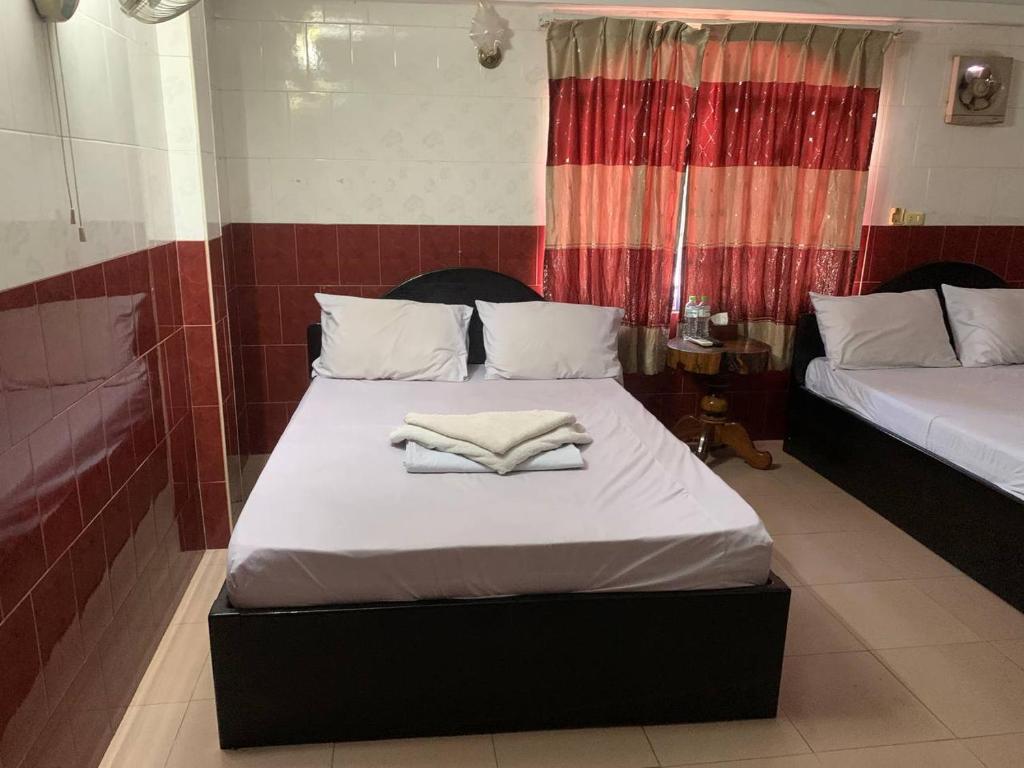 Postel nebo postele na pokoji v ubytování Ditar Guest House D