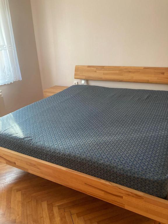 Postel nebo postele na pokoji v ubytování Platán Apartman