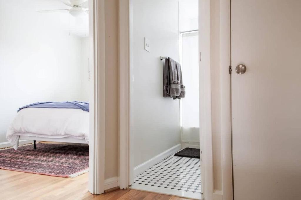 a hallway with a door leading to a bedroom at Transit-Friendly Home Old Town Parking in Alexandria