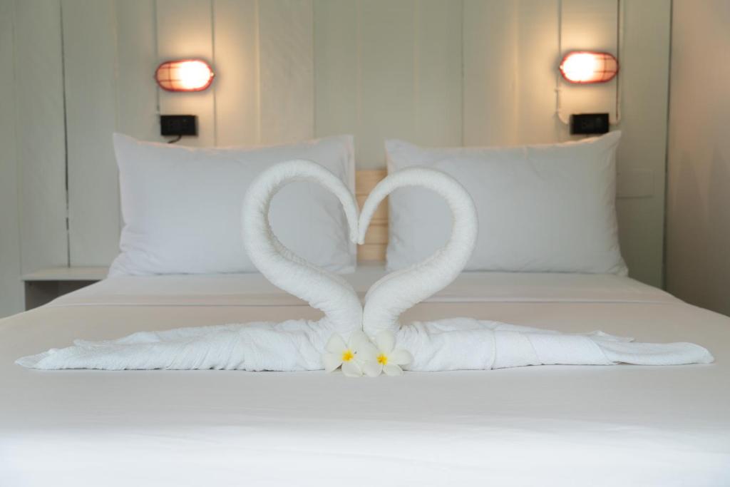 Postel nebo postele na pokoji v ubytování Slumber Resort Koh Chang