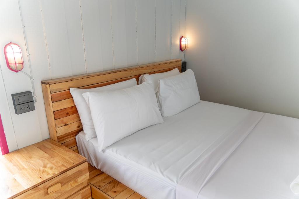 Postel nebo postele na pokoji v ubytování Slumber Resort Koh Chang