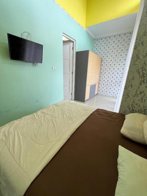 TV a/nebo společenská místnost v ubytování Casa Rani Batu Malang Villa