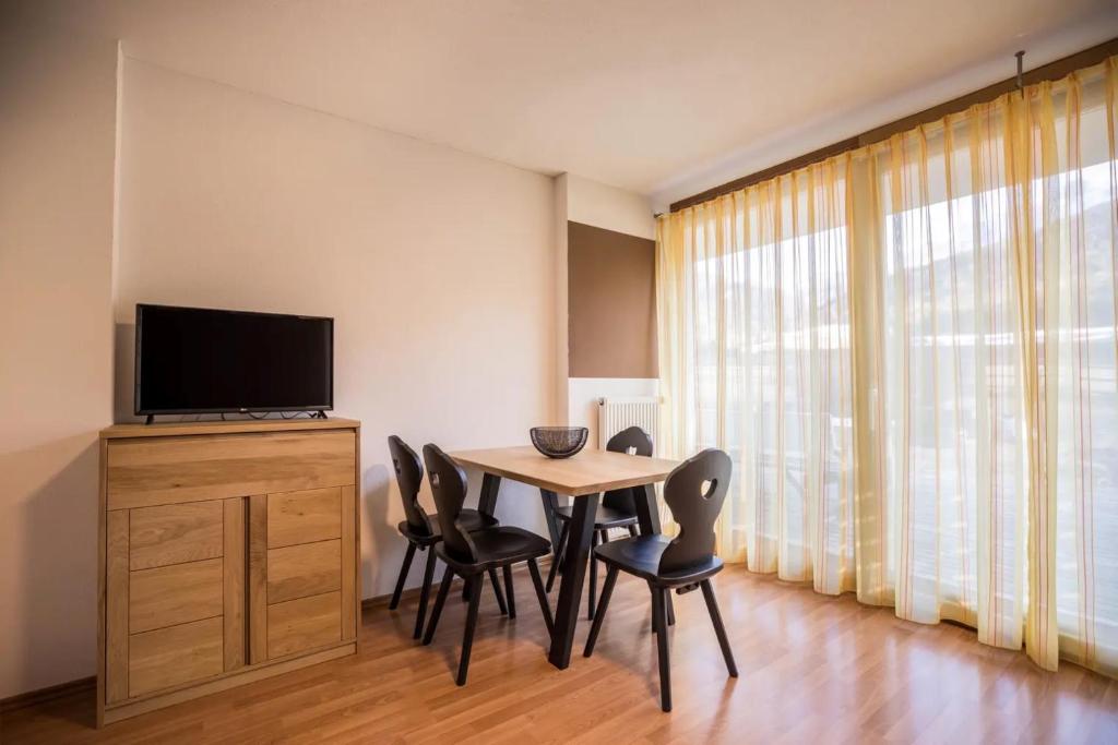 Televízia a/alebo spoločenská miestnosť v ubytovaní Appartements Durnbrunn
