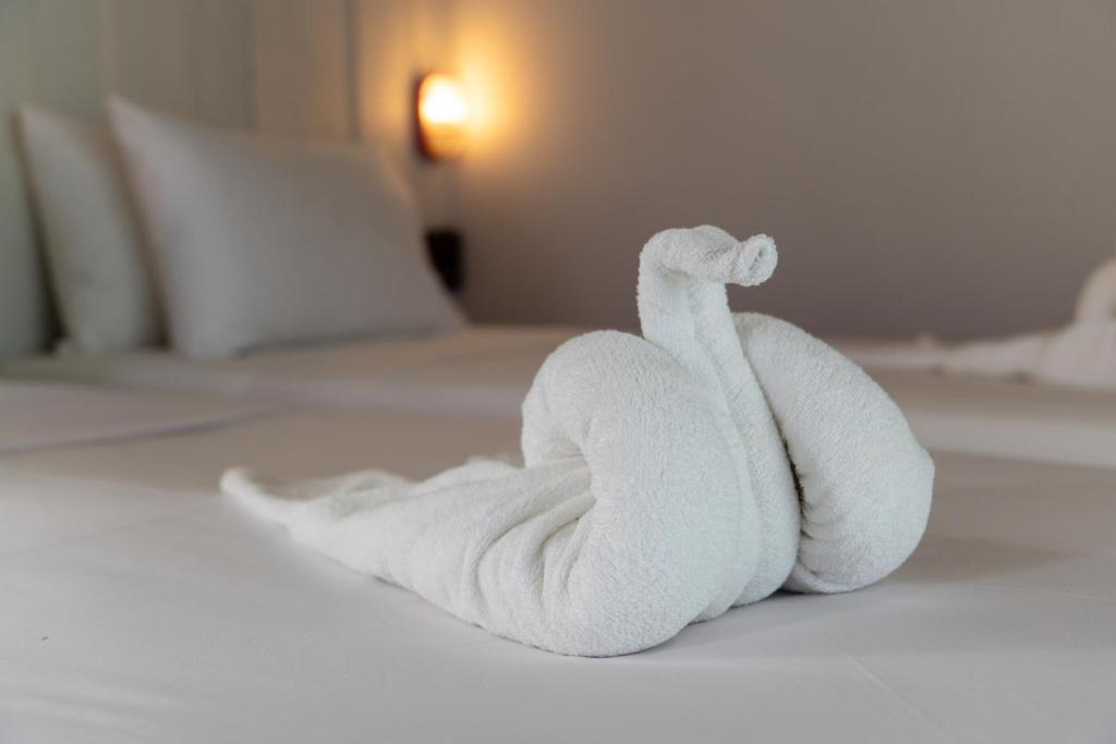 Postel nebo postele na pokoji v ubytování Slumber Resort Koh Chang