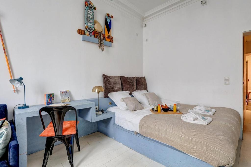 Krevet ili kreveti u jedinici u objektu 372 Suite Saulnier 2 - Superbe Appartement &agrave; Paris