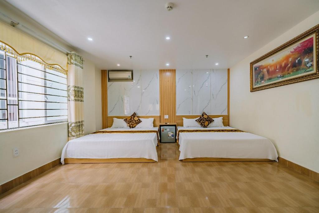 Katil atau katil-katil dalam bilik di Văn Phượng 2