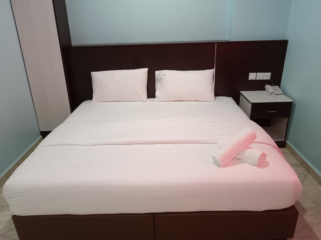Postel nebo postele na pokoji v ubytování river hotel