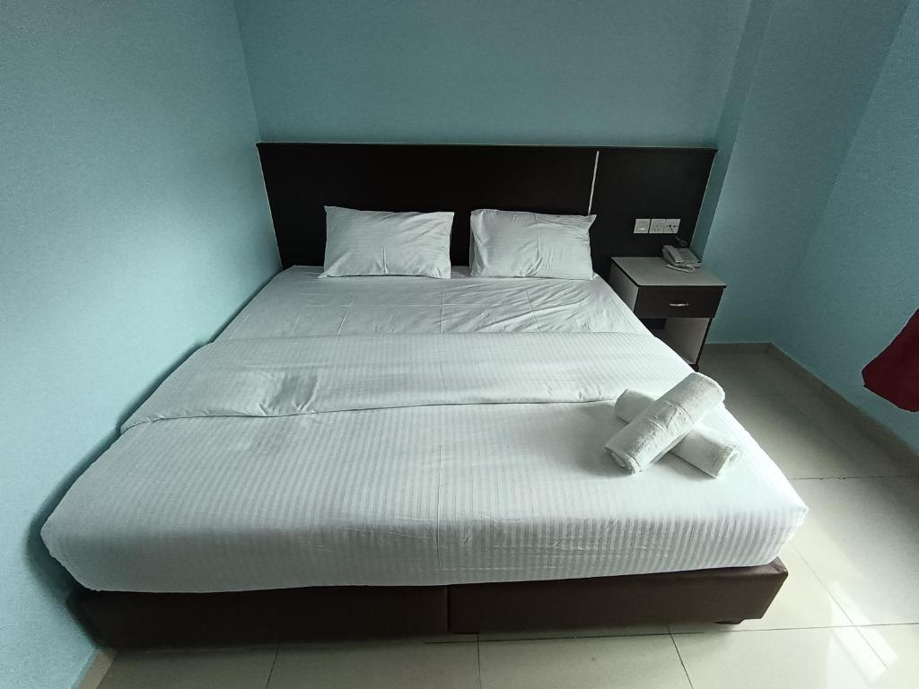 Postel nebo postele na pokoji v ubytování river hotel