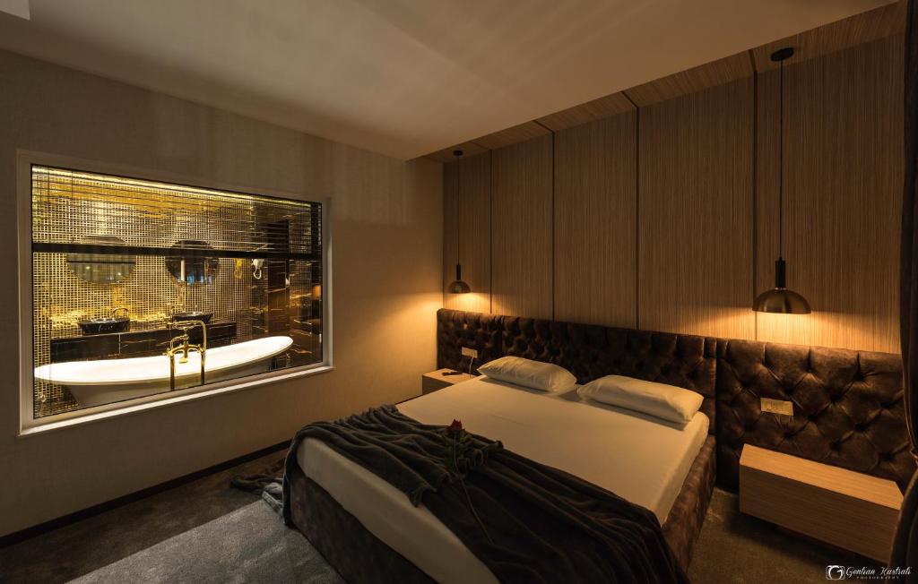 Postel nebo postele na pokoji v ubytování Vera HOTEL-VILLA