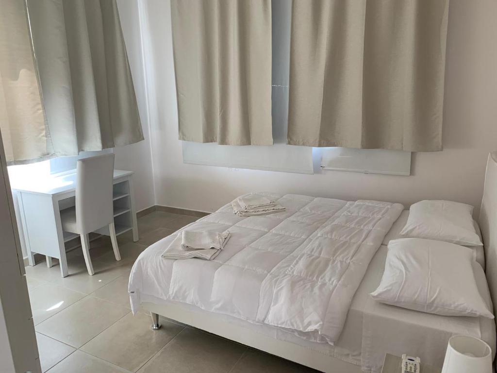 Postel nebo postele na pokoji v ubytování B&B Villa Eraclea