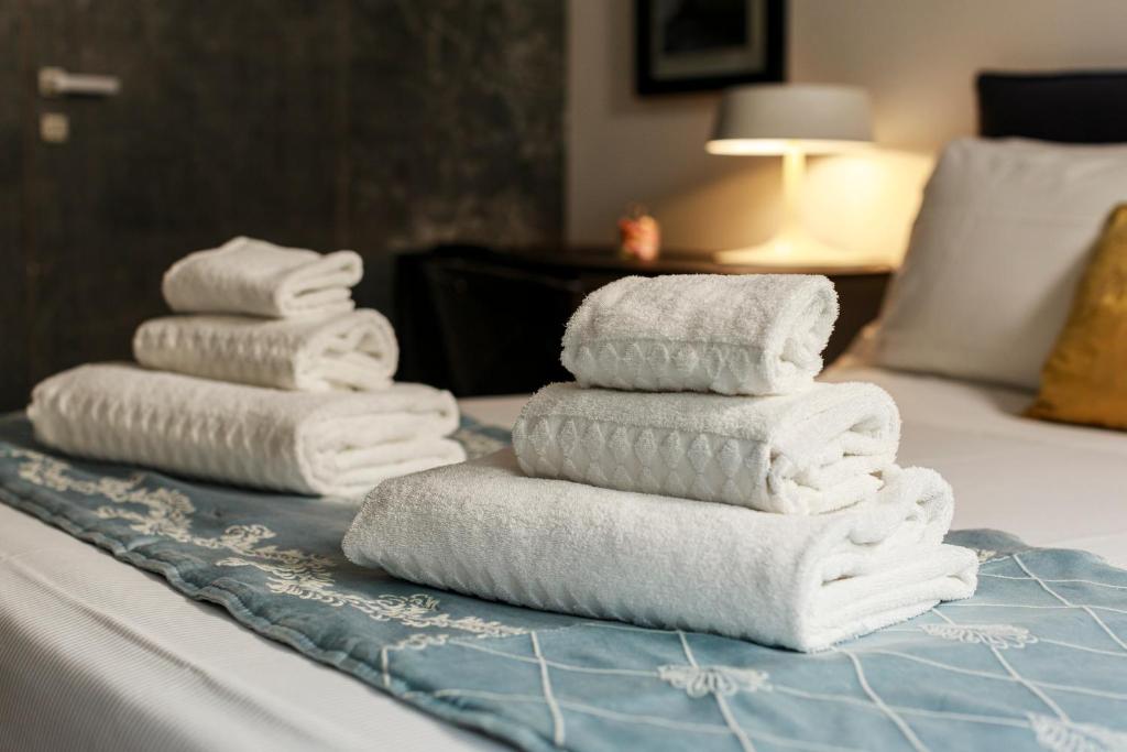 Posteľ alebo postele v izbe v ubytovaní Embrace Sicily Guest House