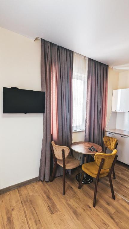 TV a/nebo společenská místnost v ubytování GG ApartHotel