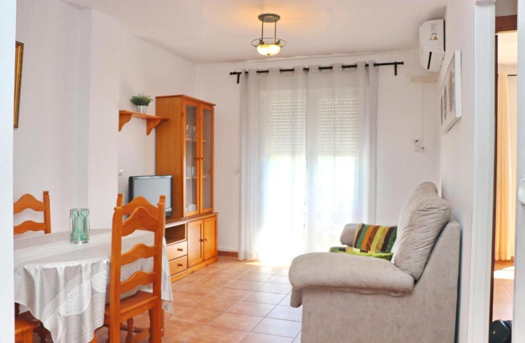 Televízia a/alebo spoločenská miestnosť v ubytovaní Apartamento vistas al parque