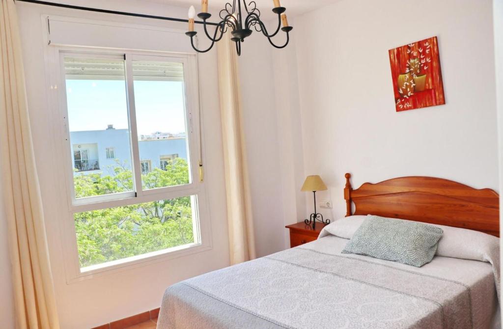 Posteľ alebo postele v izbe v ubytovaní Apartamento vistas al parque