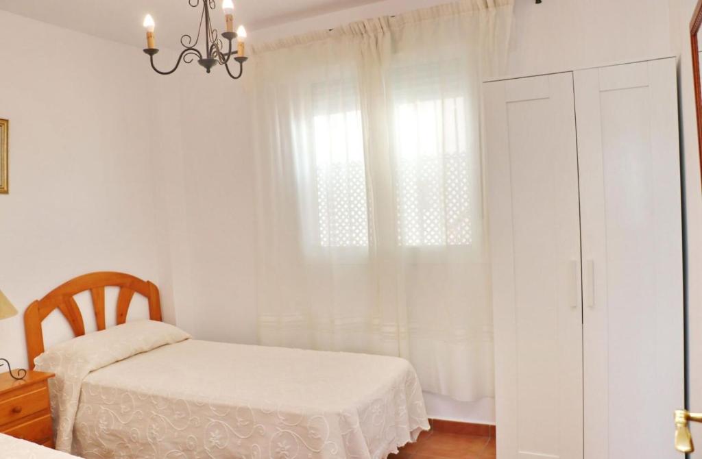 Posteľ alebo postele v izbe v ubytovaní Apartamento vistas al parque