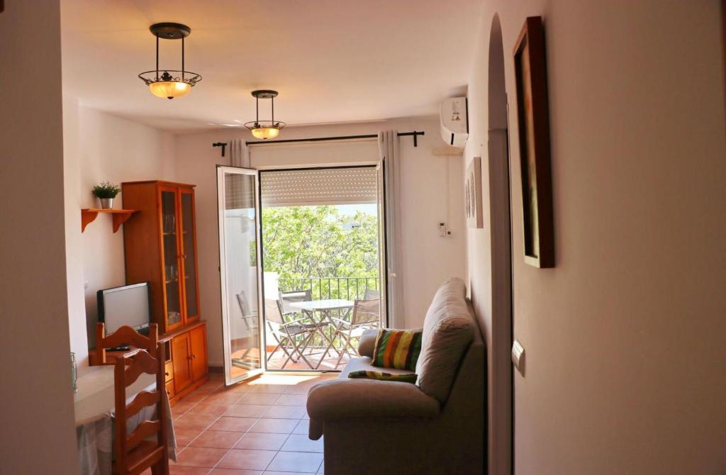 Posedenie v ubytovaní Apartamento vistas al parque