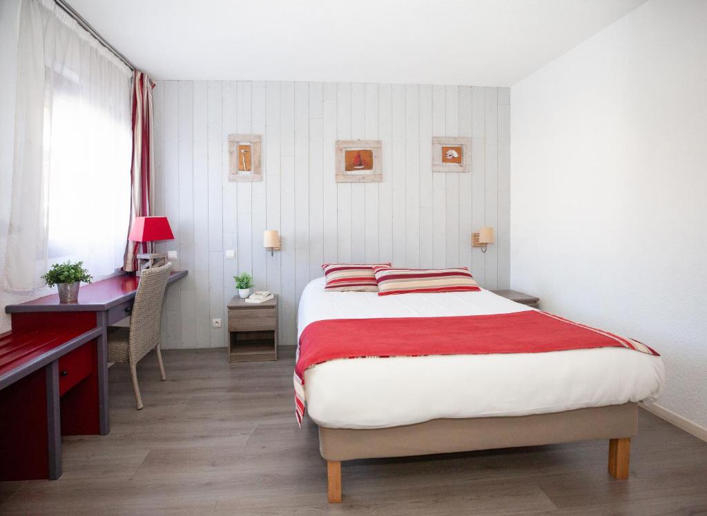 Postel nebo postele na pokoji v ubytování Hotel Atlantide