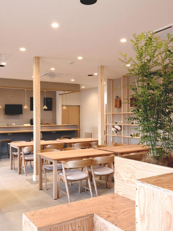 TV a/nebo společenská místnost v ubytování Matoi Hostel & Bar
