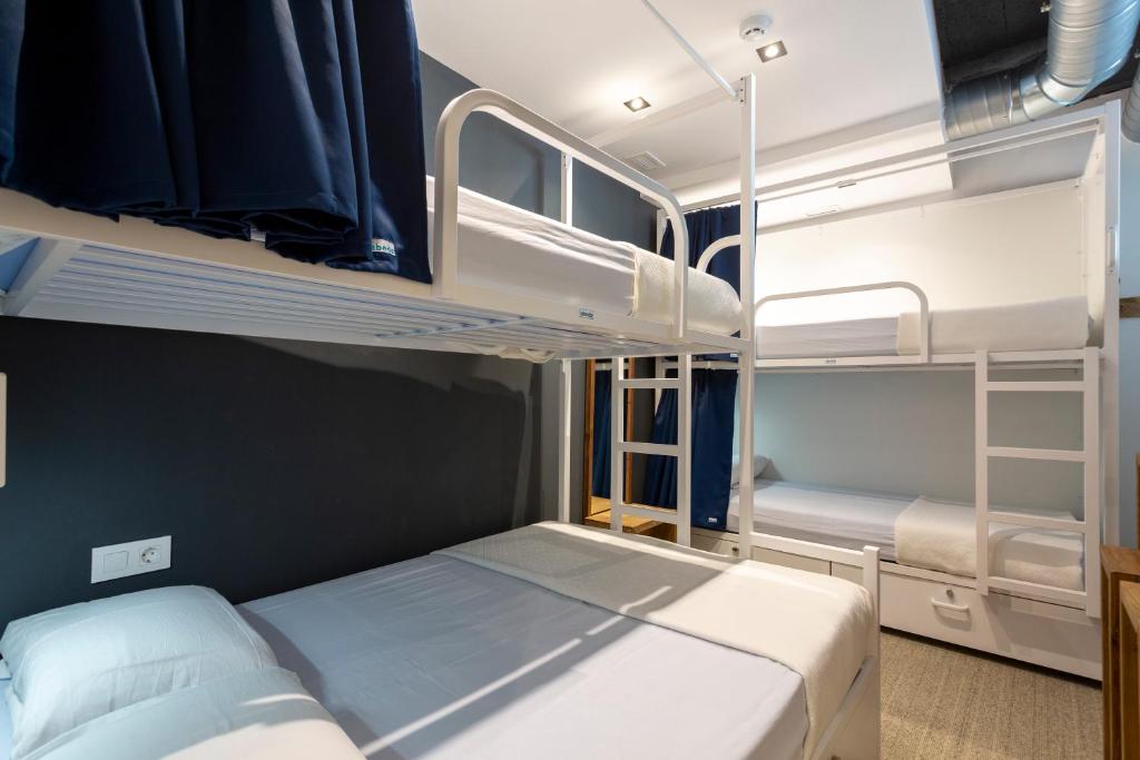 Postel nebo postele na pokoji v ubytování Malaga Stop Hostel AB