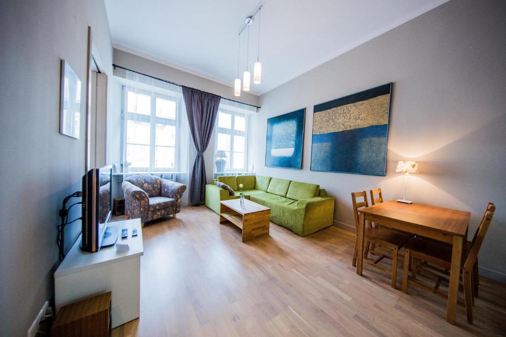a living room filled with furniture and a window at Good Night in Wroclaw - Aries in Wrocław