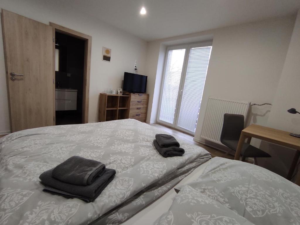 Postel nebo postele na pokoji v ubytování Symple apartments