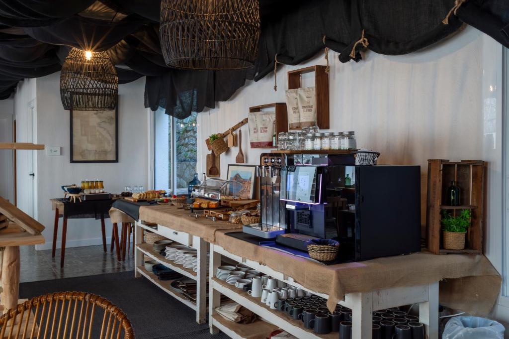 Kuchyň nebo kuchyňský kout v ubytování Hostal Boutique Es Menut