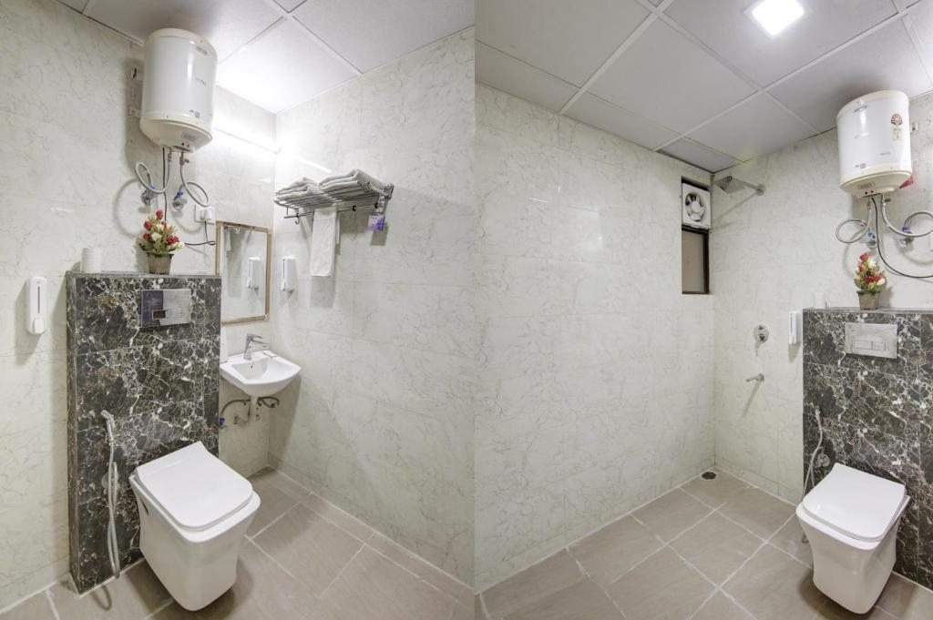 Koupelna v ubytování Limewood Stay - Executive Huda City Center