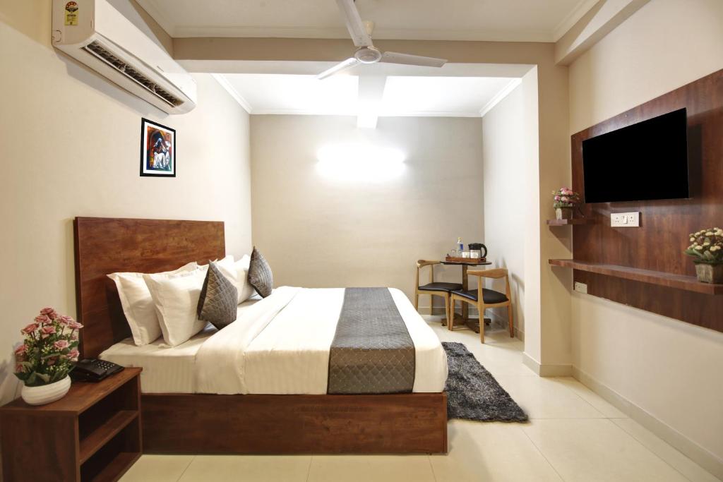 TV a/nebo společenská místnost v ubytování Limewood Stay - Executive Huda City Center