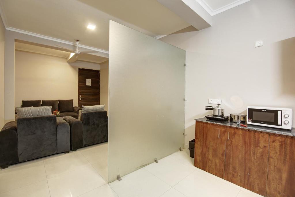 Kuchyň nebo kuchyňský kout v ubytování Limewood Stay - Executive Huda City Center