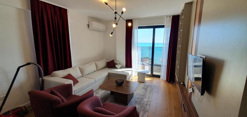TV a/nebo společenská místnost v ubytování Apartmani Jovanovic - Rafailovici