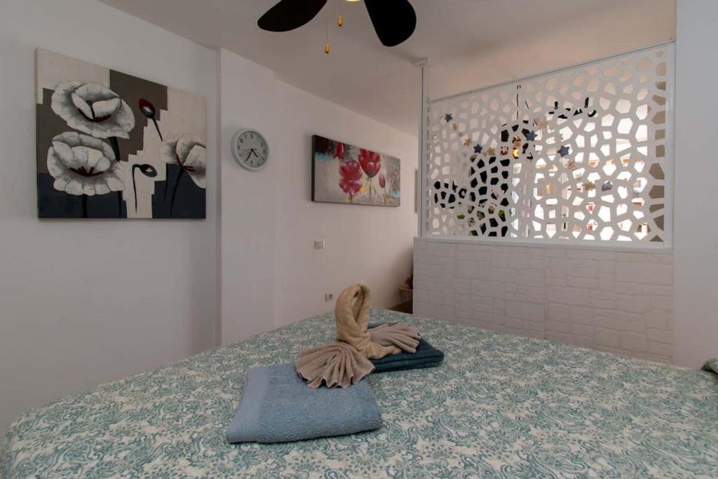 Postel nebo postele na pokoji v ubytování Borinquen 1 - Studio with amazing sea and pool views