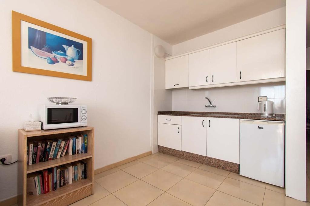 Kuchyň nebo kuchyňský kout v ubytování Azahara Playa 46 - One Bed