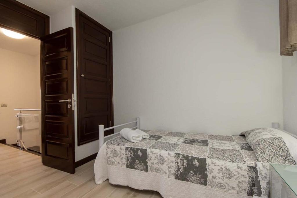 Postel nebo postele na pokoji v ubytování Park Santiago II 85 - Two Bed