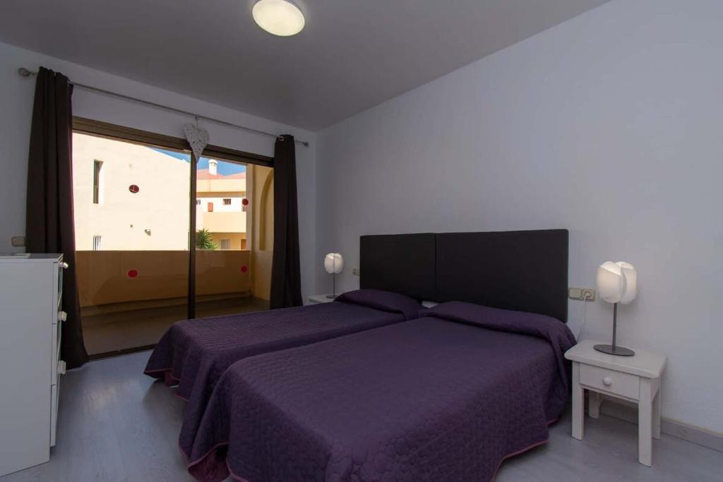 A bed or beds in a room at Mare Verde 95 - One Bed