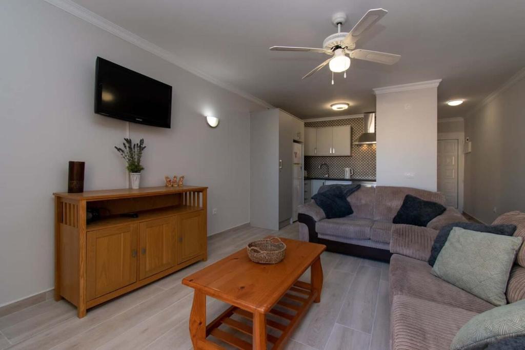 Televízia a/alebo spoločenská miestnosť v ubytovaní Mare Verde 6 - Two Bed