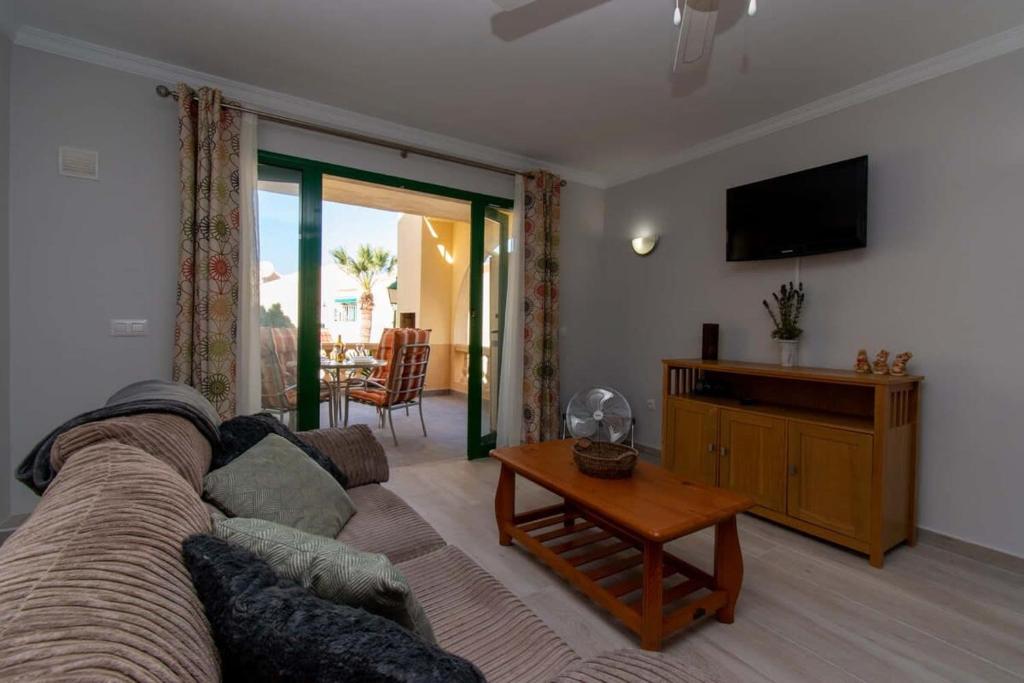 Televízia a/alebo spoločenská miestnosť v ubytovaní Mare Verde 6 - Two Bed